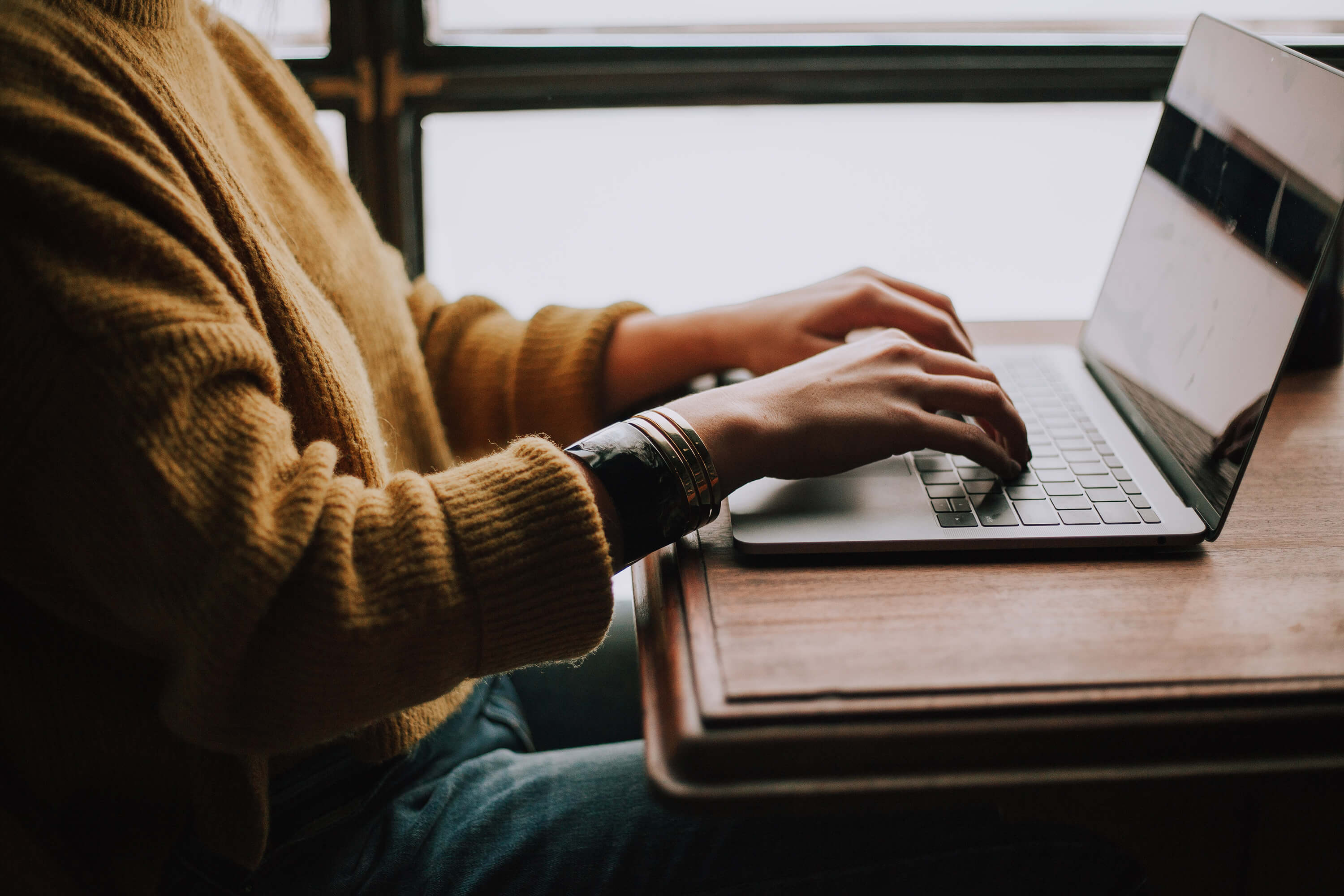 girl using laptop for web design